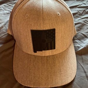 Fitted Hat w/NM state symbol with zia/flag inside